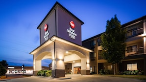A hotel with a prominent 'Best Western Plus' sign, a covered entrance, and a parking lot. - Best Western Plus Country Inn & Suites (Dodge City)