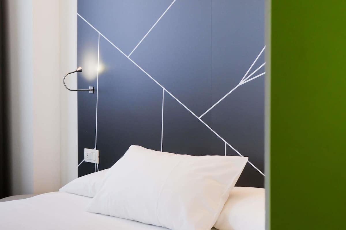 Premium bedding, down duvets, in-room safe, individually decorated