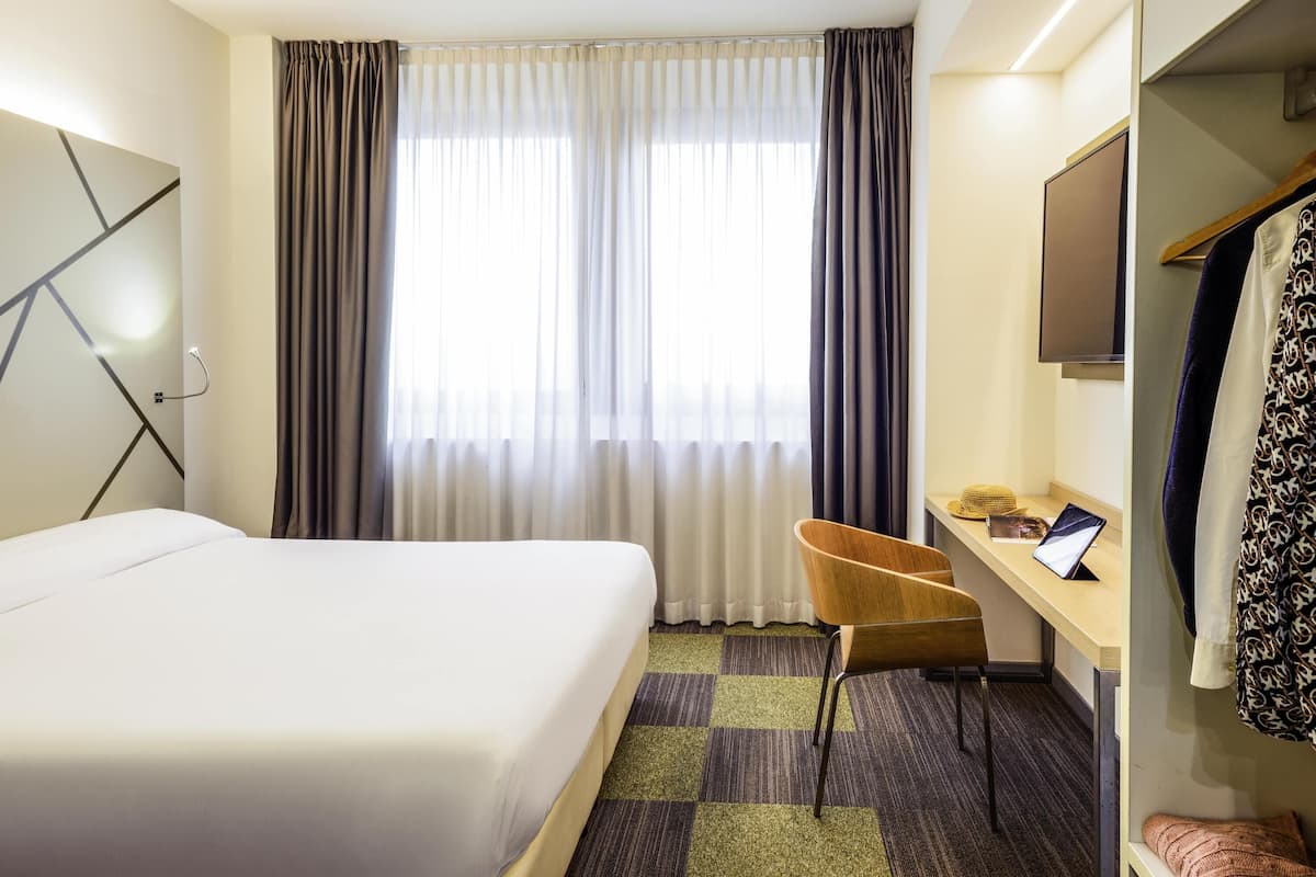 Premium bedding, down duvets, in-room safe, individually decorated