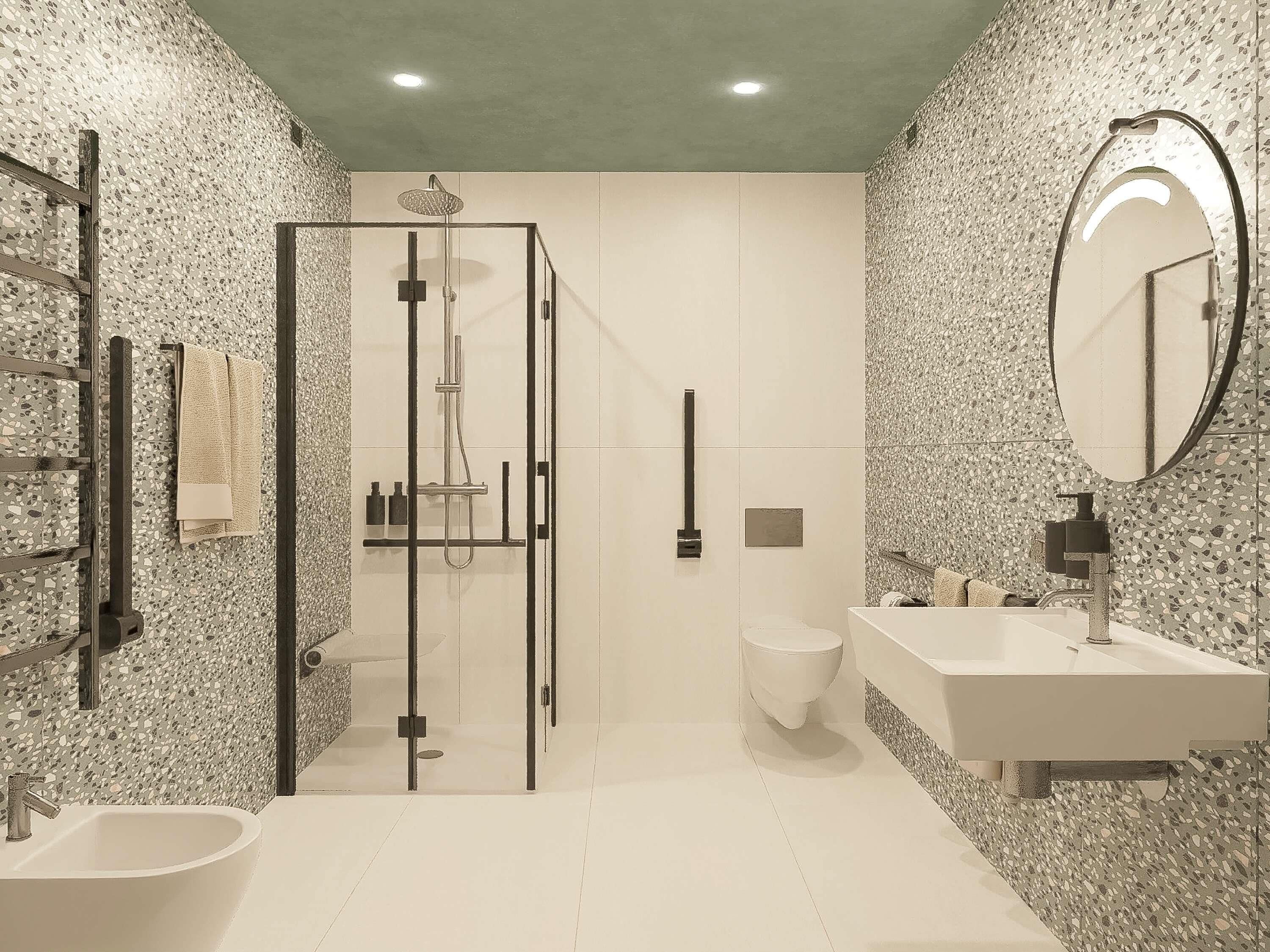 A modern bathroom with a glass-enclosed shower, a white sink, and a large mirror.