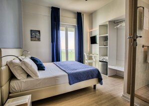 Dobbeltrom – superior | Sengetøy av topp kvalitet, minibar, safe på rommet og skrivebord