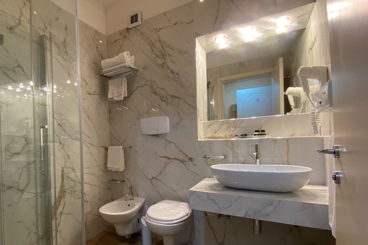 comfort double or twin room | bathroom | shower, hair dryer, towels