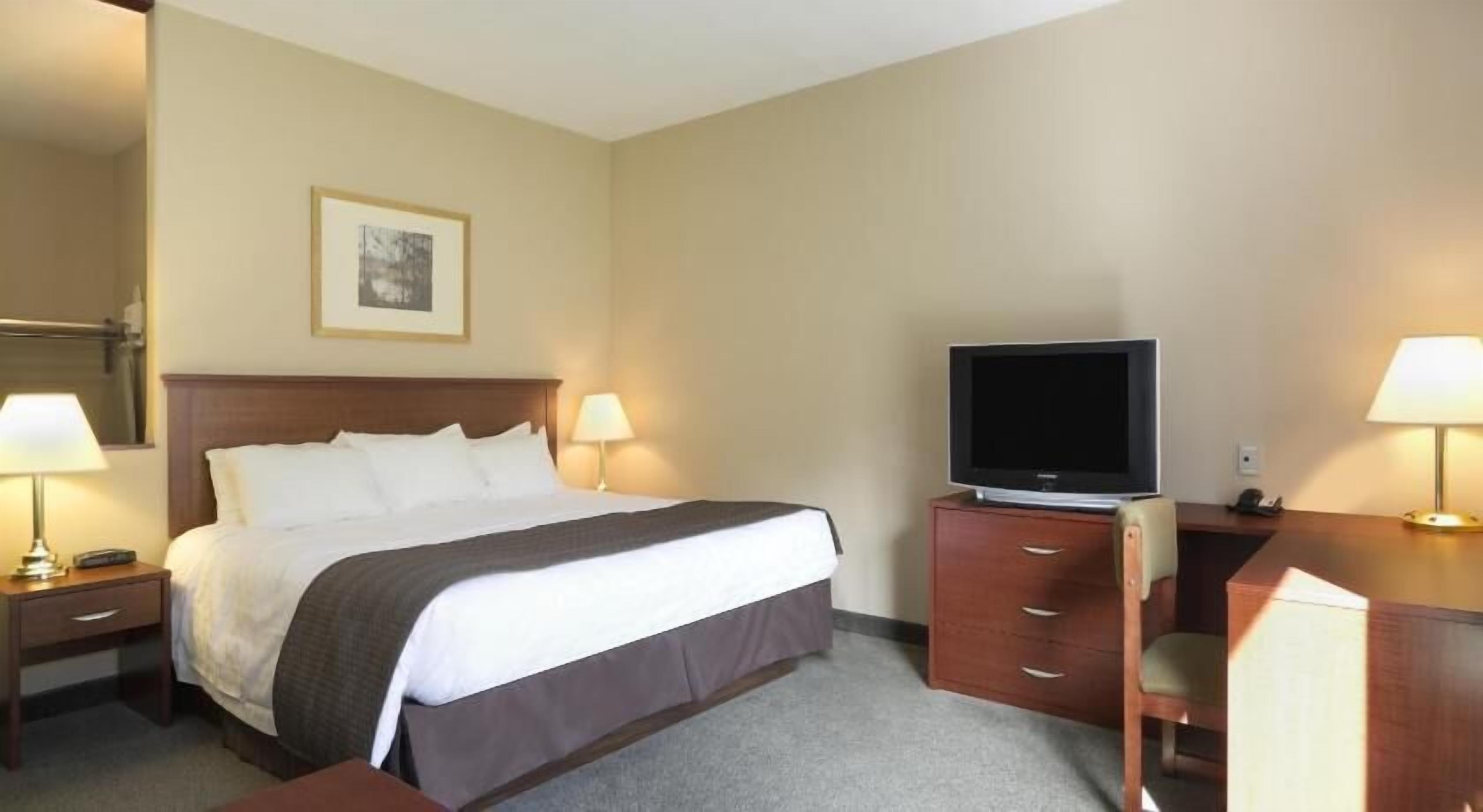 Blackout curtains, iron/ironing board, rollaway beds, Internet