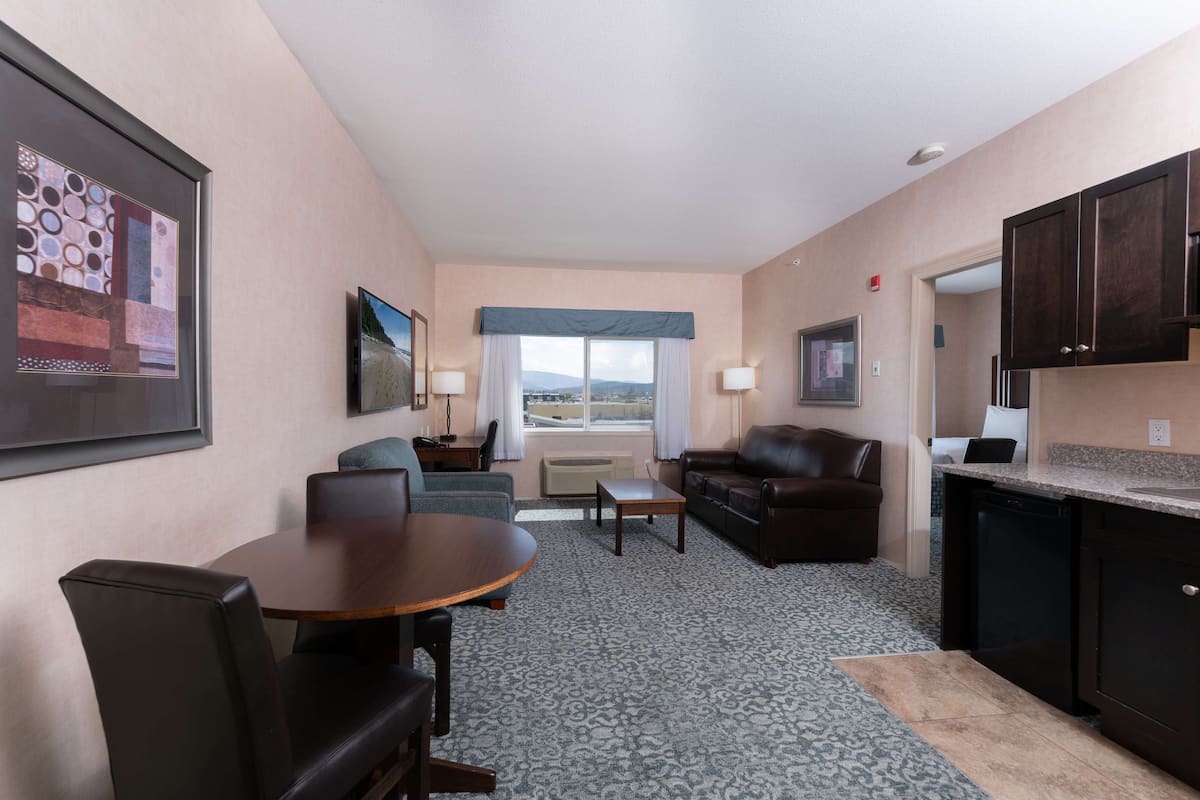 Suite, 2 Queen Beds, Non Smoking, Kitchenette (Separate Living Room) | 1 bedroom, desk, iron/ironing board, cribs/infant beds