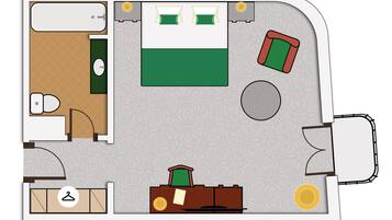 Distribución de una habitación de hotel con cama, dos mesitas de noche, armario, baño y zona de estar.