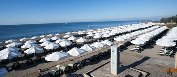 Private beach, sun loungers, beach umbrellas, beach towels