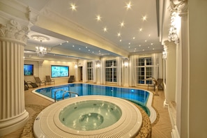Indoor pool, open 9:00 AM to 8:30 PM, pool loungers