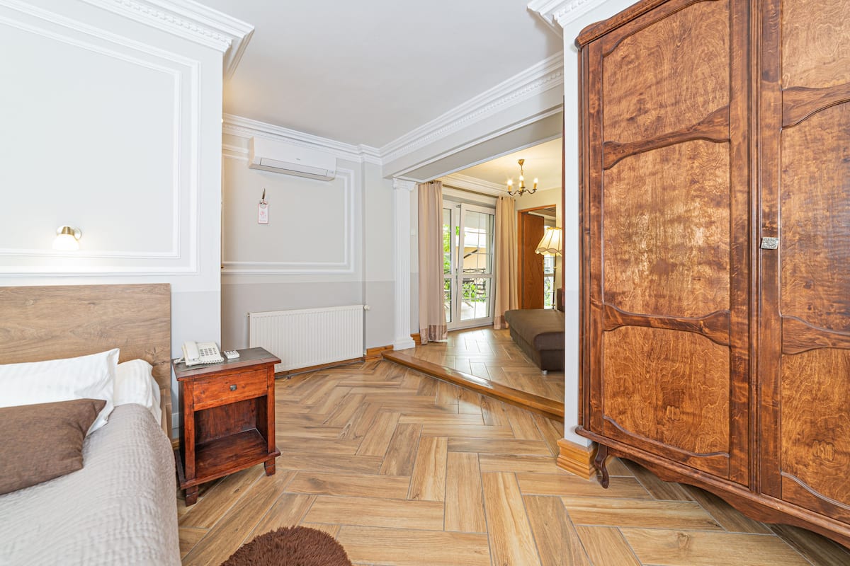 classic double room | living area | flat-screen tv