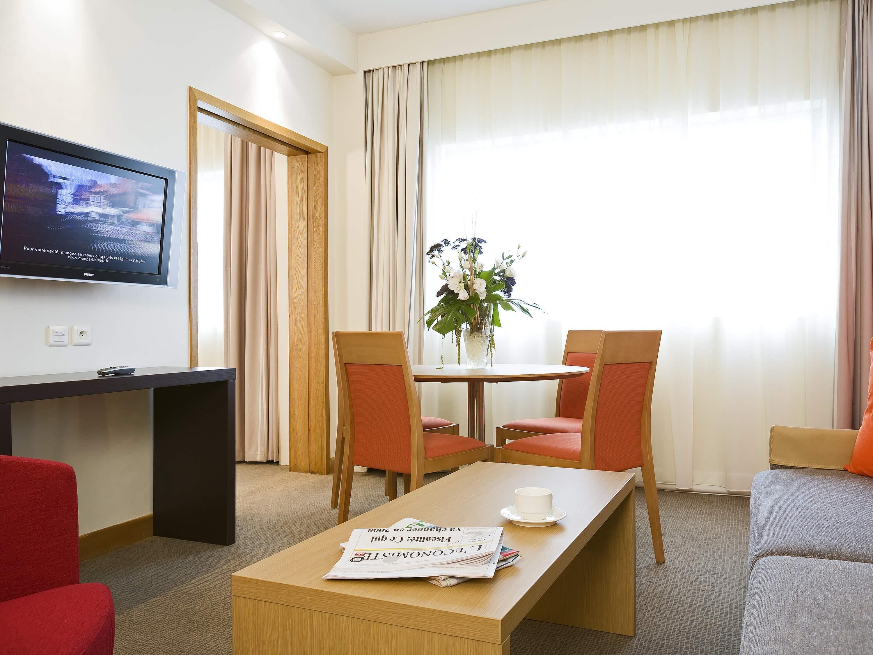 Junior Suite, 1 King Bed with Sofa bed | In-room safe, desk, laptop workspace, blackout drapes