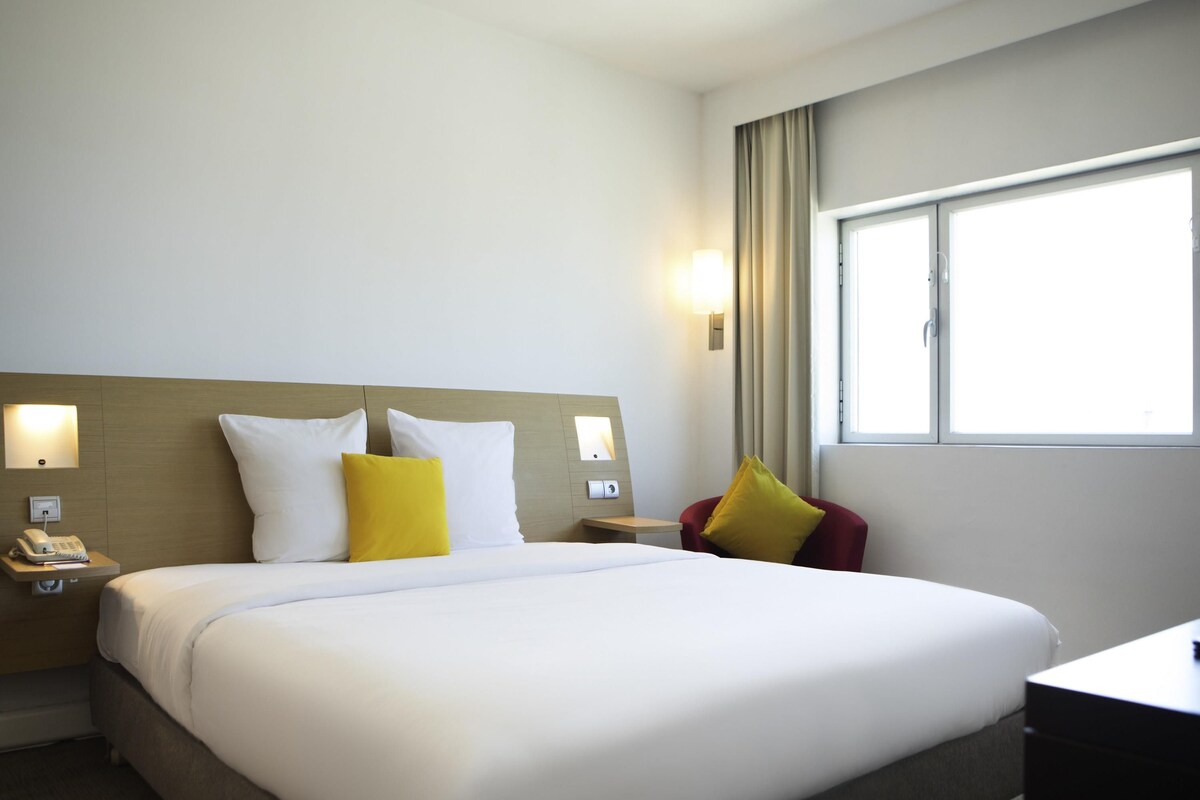 Junior Suite, 1 King Bed with Sofa bed | In-room safe, desk, laptop workspace, blackout curtains