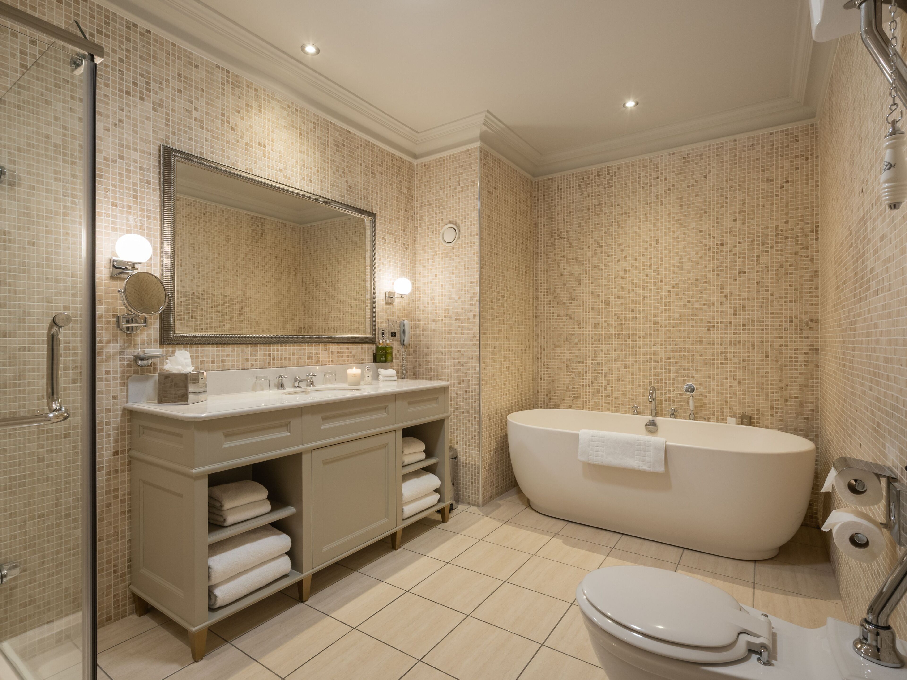 junior suite | bathroom | shower, rainfall showerhead, eco-friendly toiletries, hair dryer