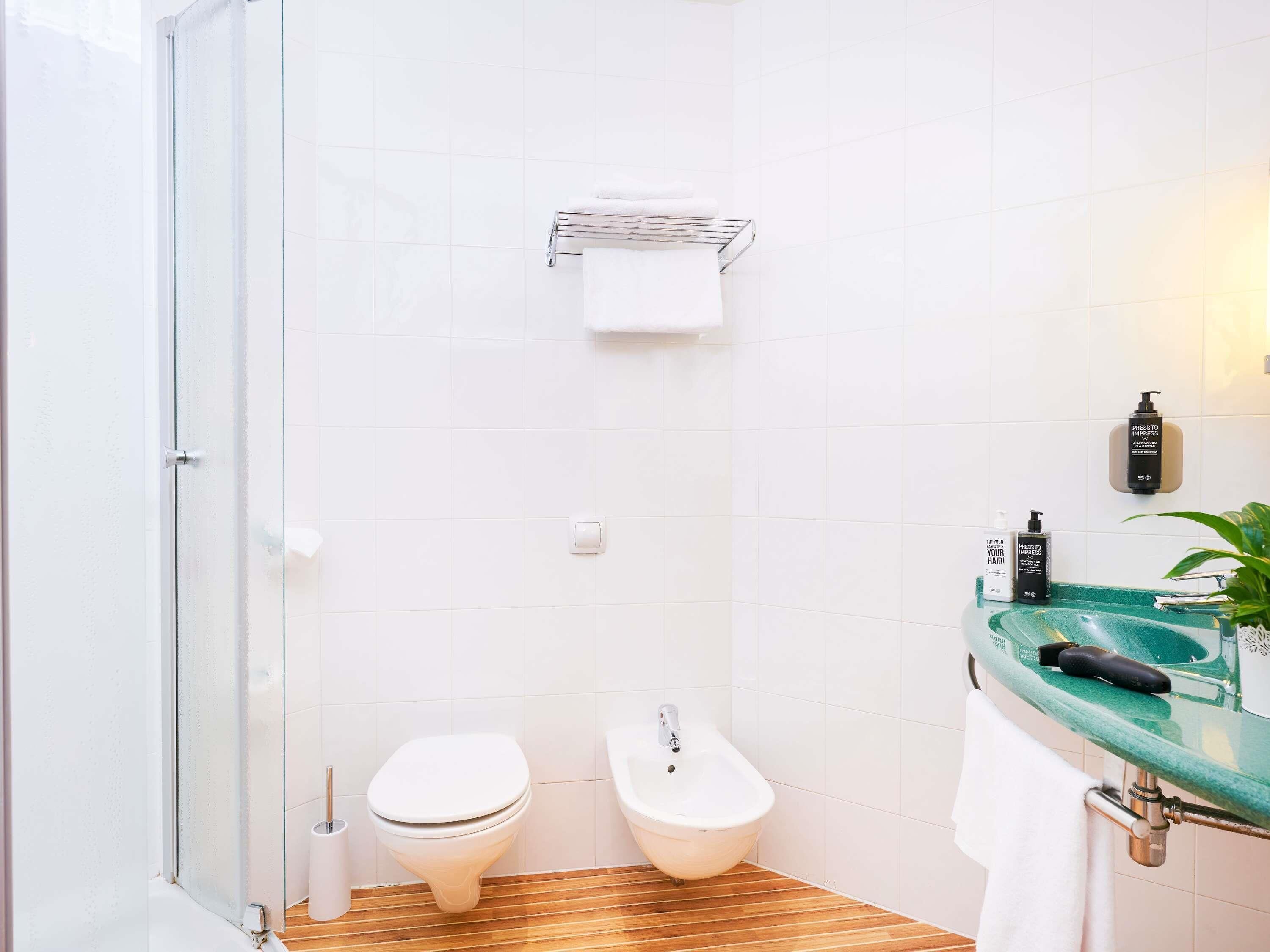 shower, eco-friendly toiletries, hair dryer, bidet