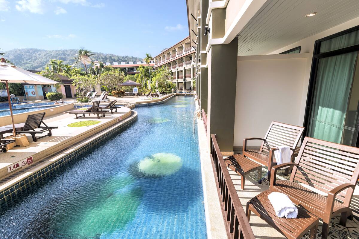 Deluxe Room, Pool Access | Water view