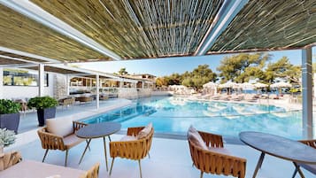 Indoor pool, 2 outdoor pools, open 9:00 AM to 9:00 PM, pool umbrellas