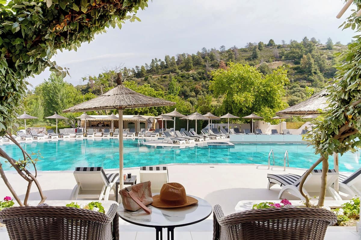 Suite, Pool View (Armonia) | Minibar, in-room safe, blackout curtains, free WiFi