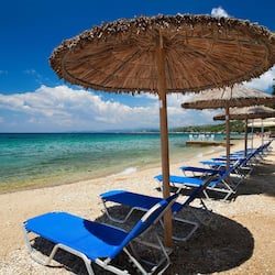 Private beach, white sand, sun loungers, beach umbrellas