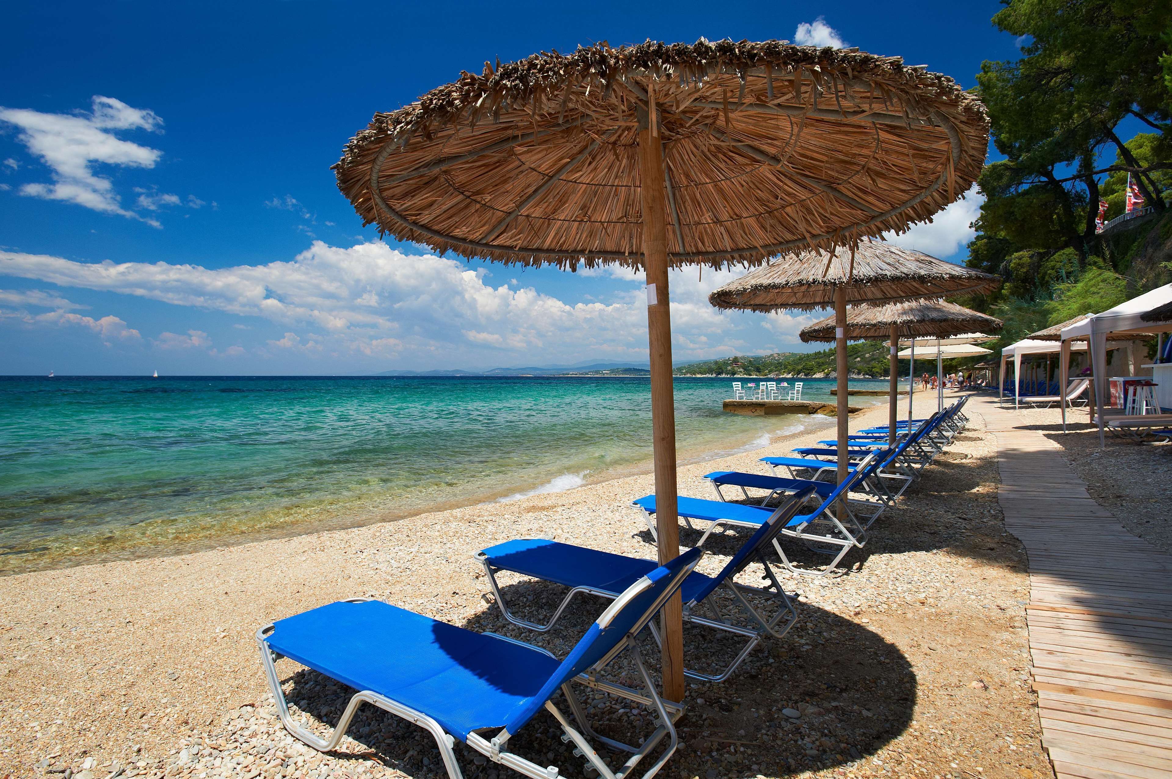 Private beach, white sand, sun-loungers, beach umbrellas