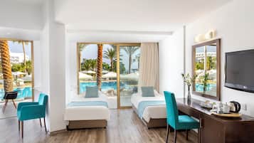 Family Room, Pool View (Superior) | Minibar, in-room safe, desk, blackout drapes