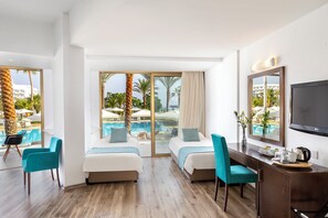Family Room, Pool View (Superior) | Minibar, in-room safe, desk, blackout drapes - Crystal Springs Beach Hotel (Paralimni)
