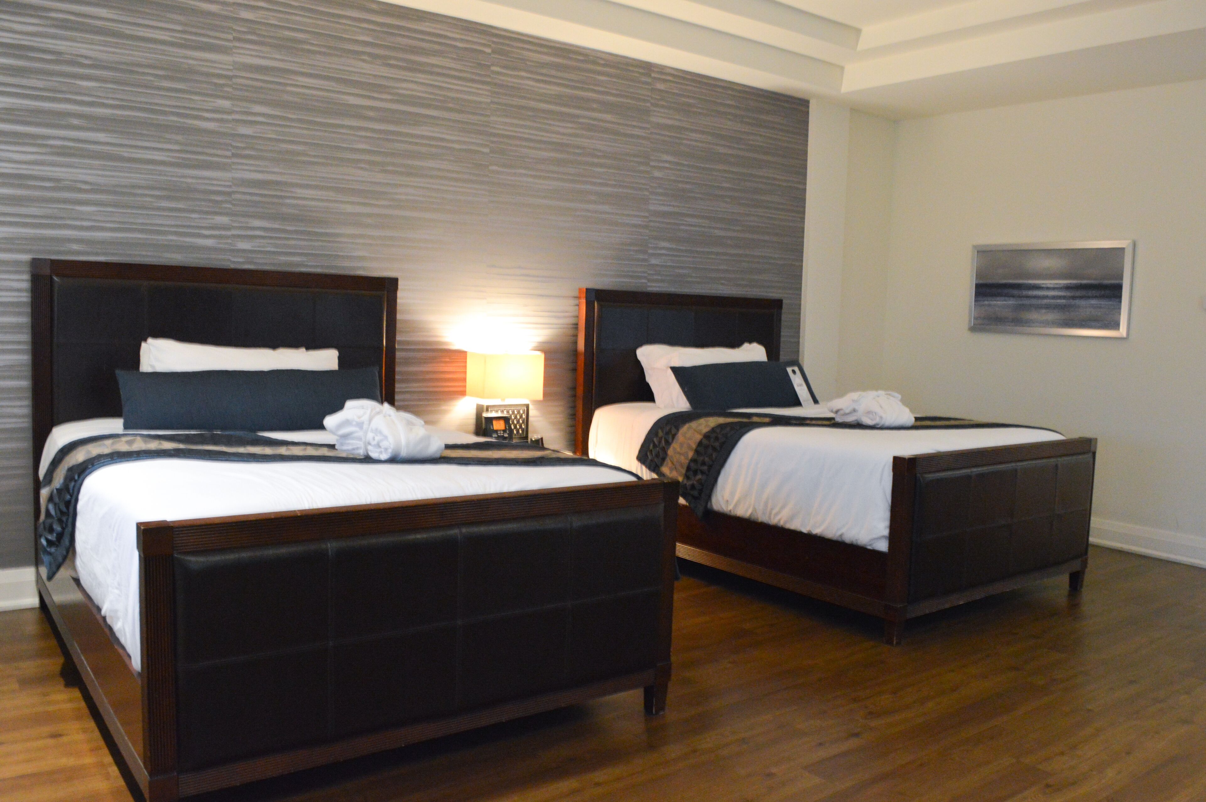 two queen bed suite | premium bedding, in-room safe, individually decorated