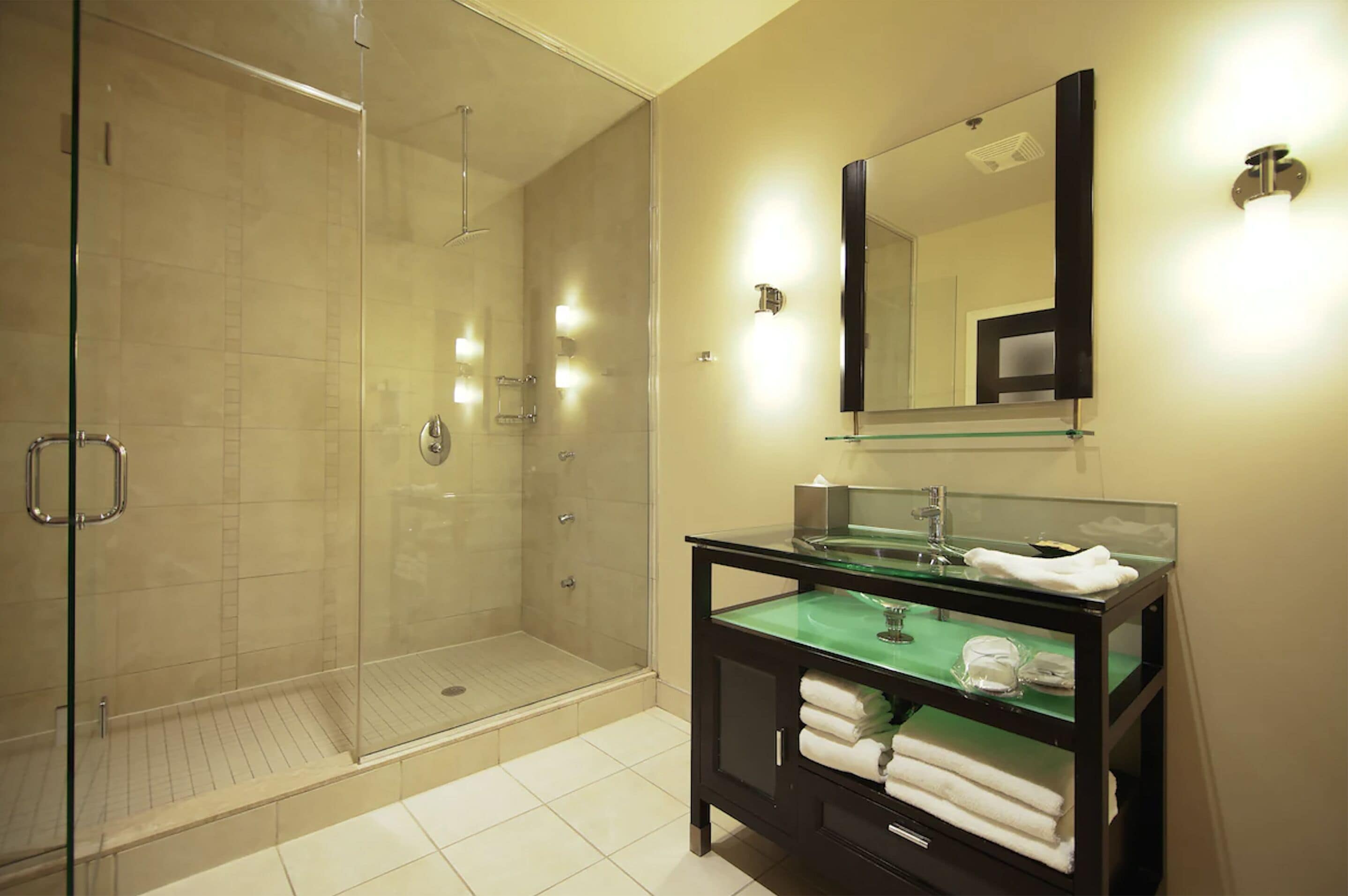 designer toiletries, hair dryer, bathrobes, towels