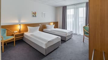 Desk, blackout drapes, cribs/infant beds, rollaway beds