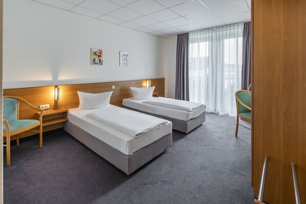 Desk, blackout curtains, cots/infant beds, rollaway beds