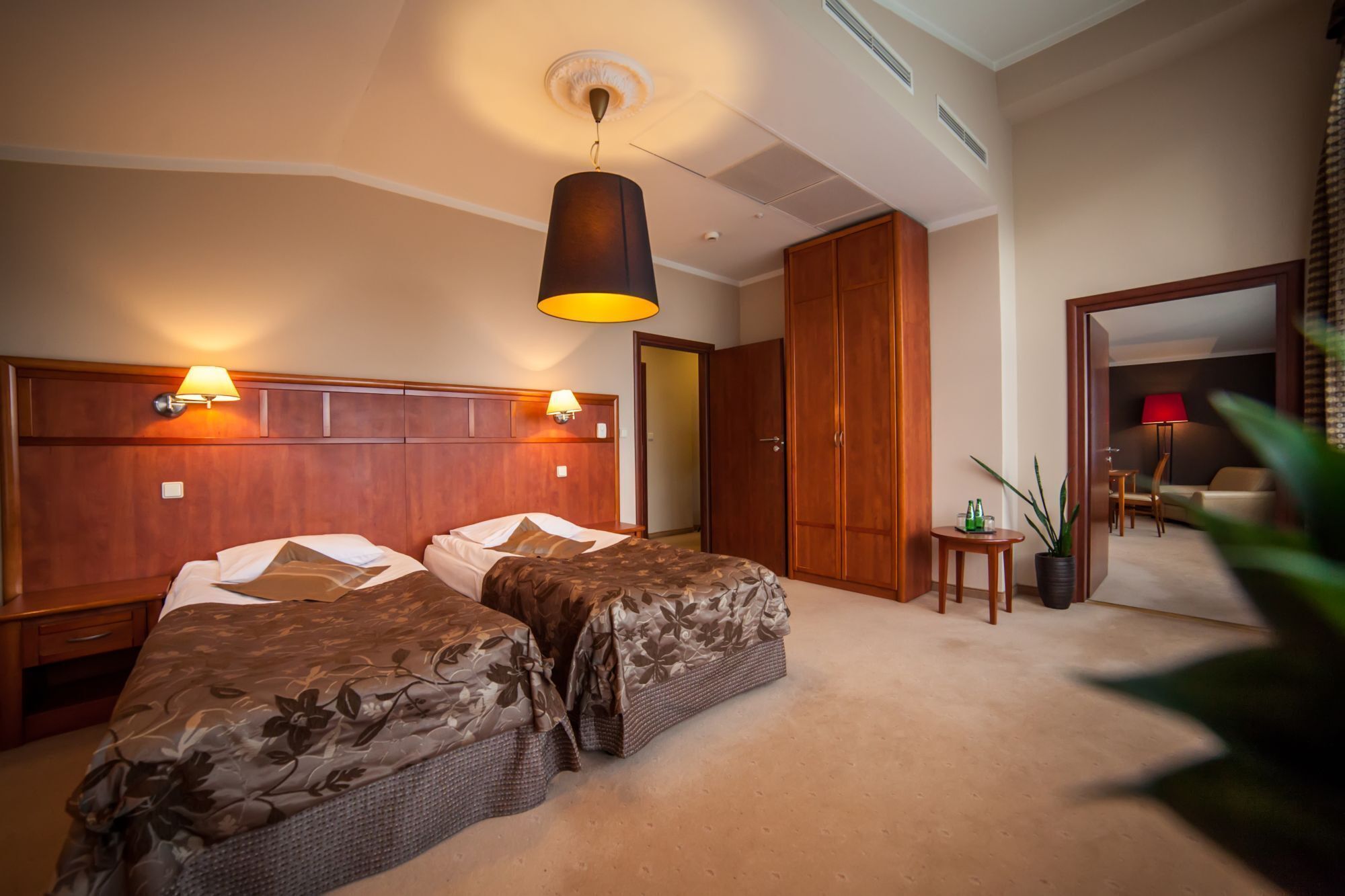family room | premium bedding, minibar, in-room safe, individually decorated