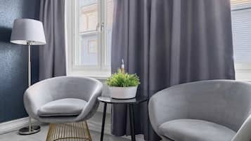 Family Room | Premium bedding, individually decorated, desk, blackout curtains