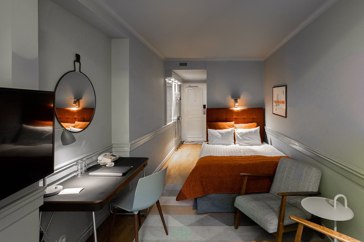 economy double room (140 cm bed) | premium bedding, desk, laptop workspace, blackout curtains