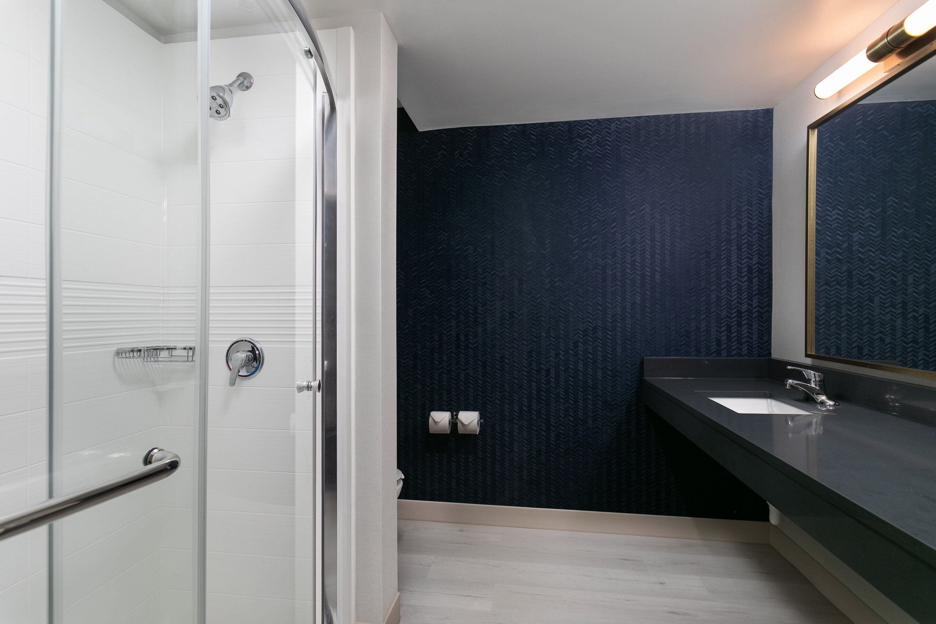 combined shower/bathtub, hair dryer, towels, soap