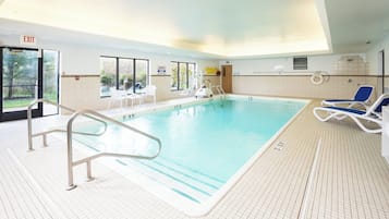 Indoor pool, open 7 AM to 11 PM, pool loungers