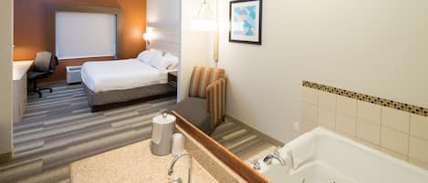 Suite, 1 King Bed, Jetted Tub | Premium bedding, pillowtop beds, in-room safe, iron/ironing board