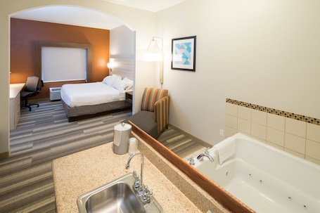 Suite, 1 King Bed, Jetted Tub | Premium bedding, pillowtop beds, in-room safe, iron/ironing board