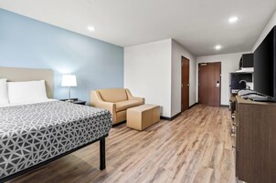Escritorio, tabla de planchar con plancha, wifi gratis y ropa de cama 