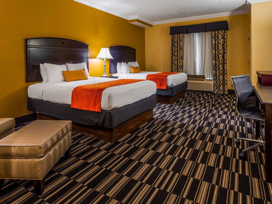 Premium bedding, pillowtop beds, desk, laptop workspace