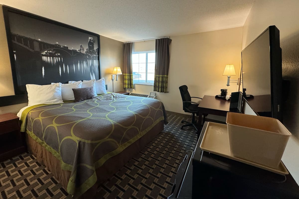 Room, 1 King Bed, Non Smoking | Individually furnished, desk, laptop workspace, blackout curtains
