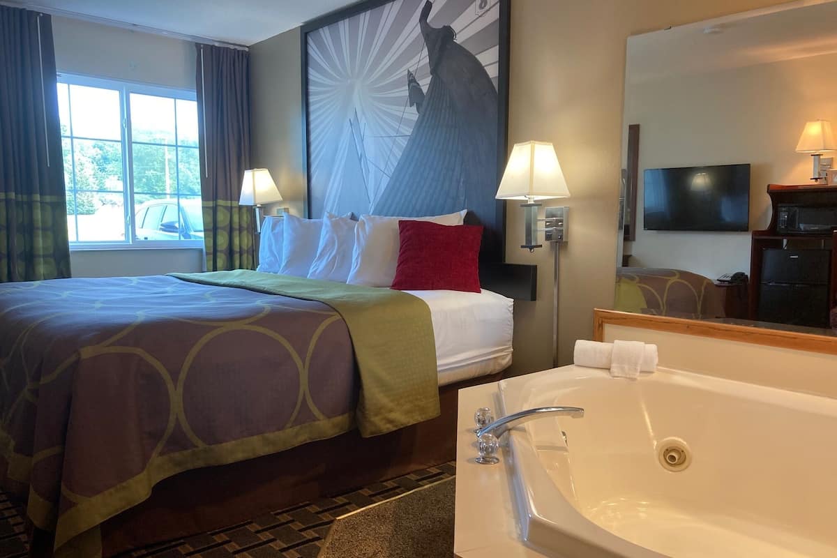 Suite, 1 King Bed, Non Smoking | Individually furnished, desk, laptop workspace, blackout curtains