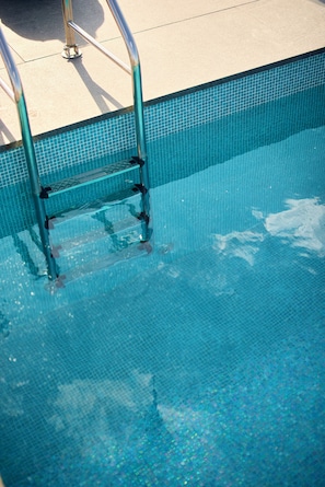 Seasonal outdoor pool, pool umbrellas