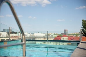 Seasonal outdoor pool, pool umbrellas
