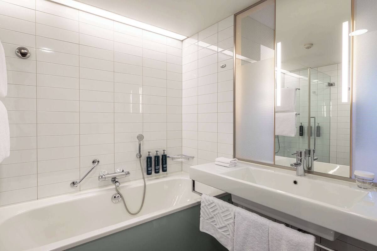 separate bathtub and shower, free toiletries, hair dryer, towels