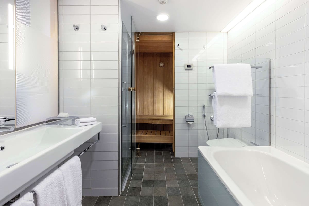 executive room, 1 king bed (plus) | bathroom | separate bathtub and shower, free toiletries, hair dryer, towels