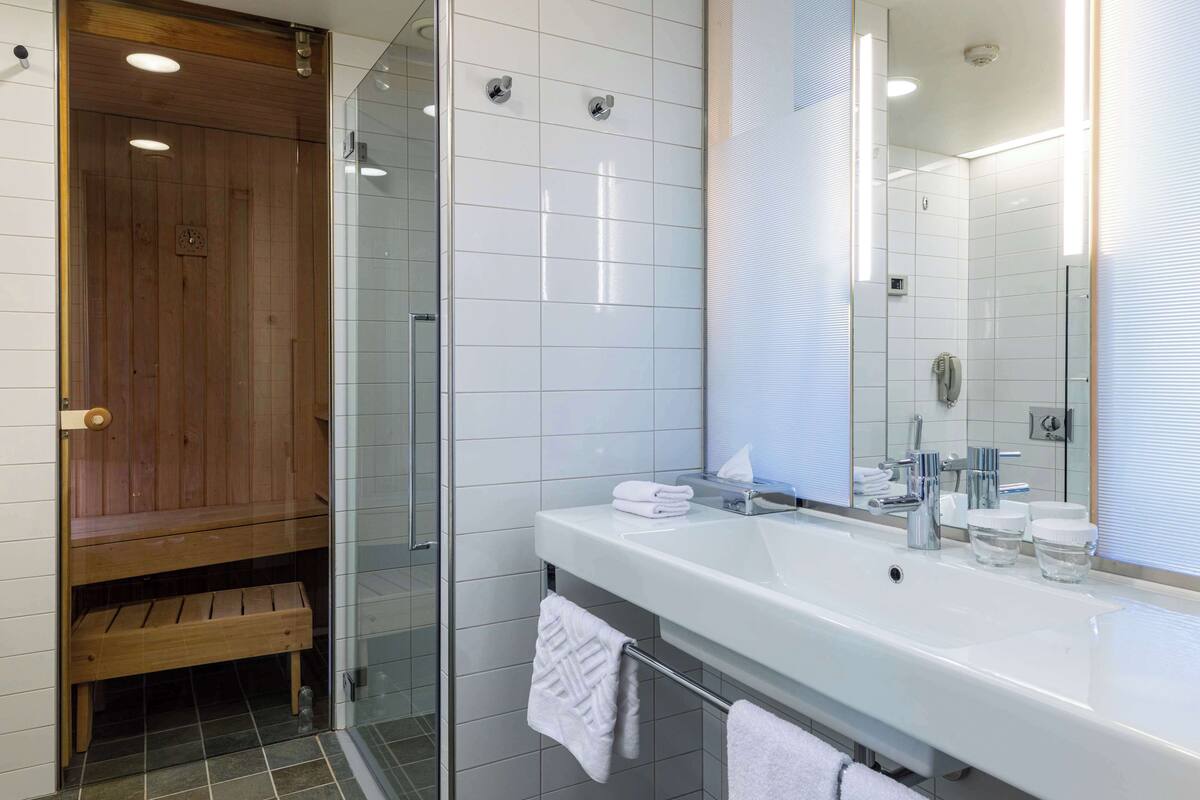 junior suite, 1 king bed | bathroom | separate bathtub and shower, free toiletries, hair dryer, towels