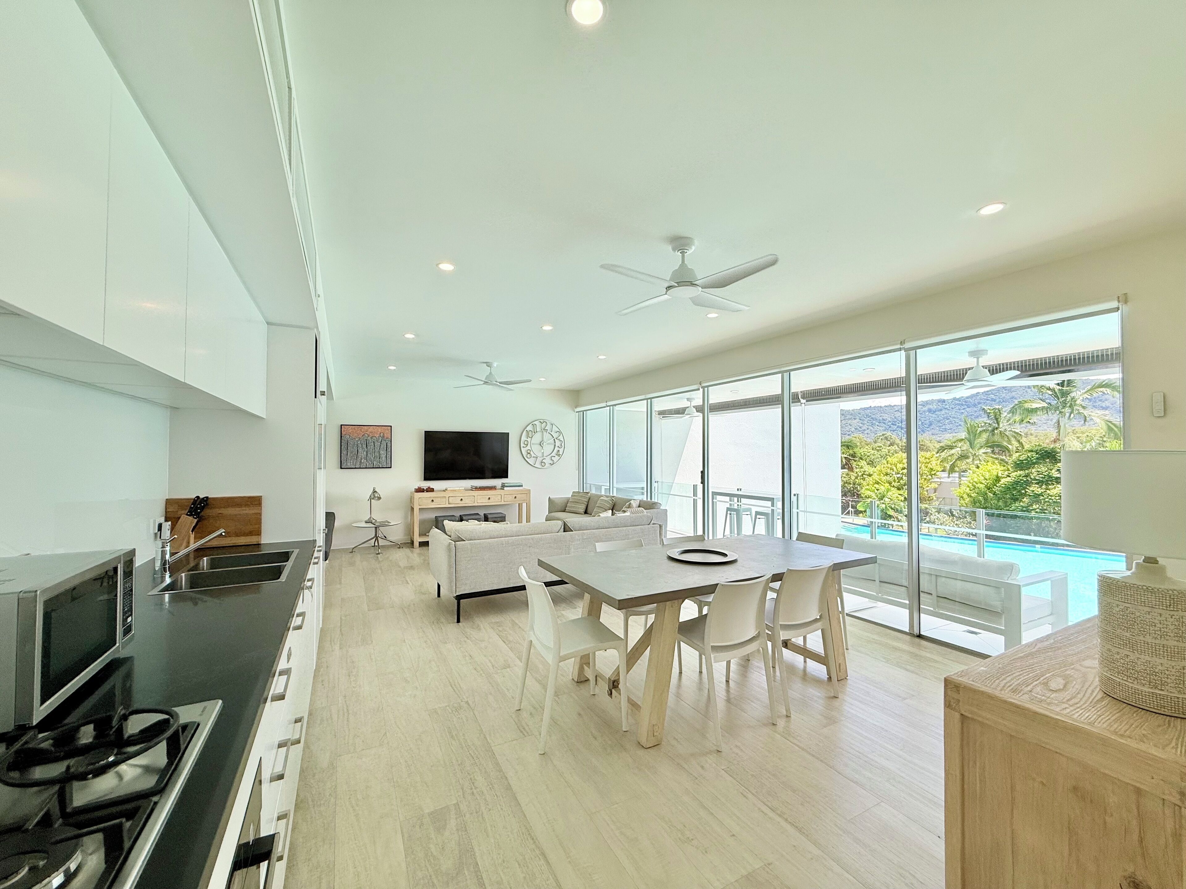3 Bedroom Sunset Pool View | Living area | 50-inch Smart TV with digital channels, Netflix, books
