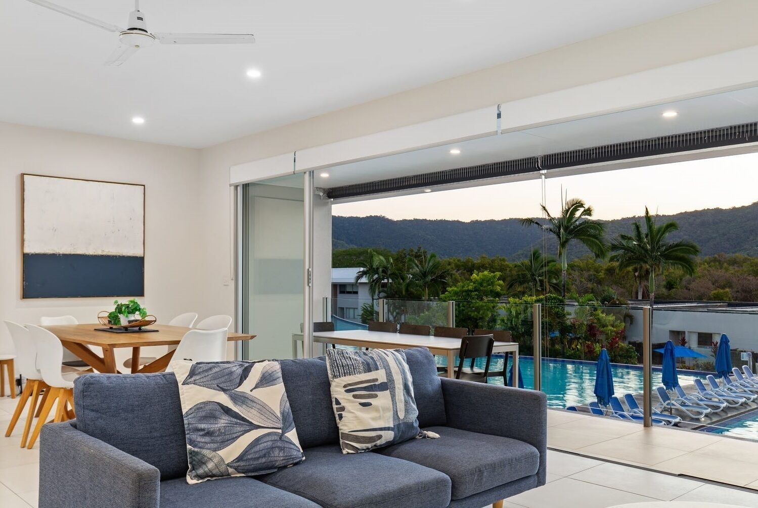 3 Bedroom Sunset Pool View | Living area | 50-inch Smart TV with digital channels, Netflix, books