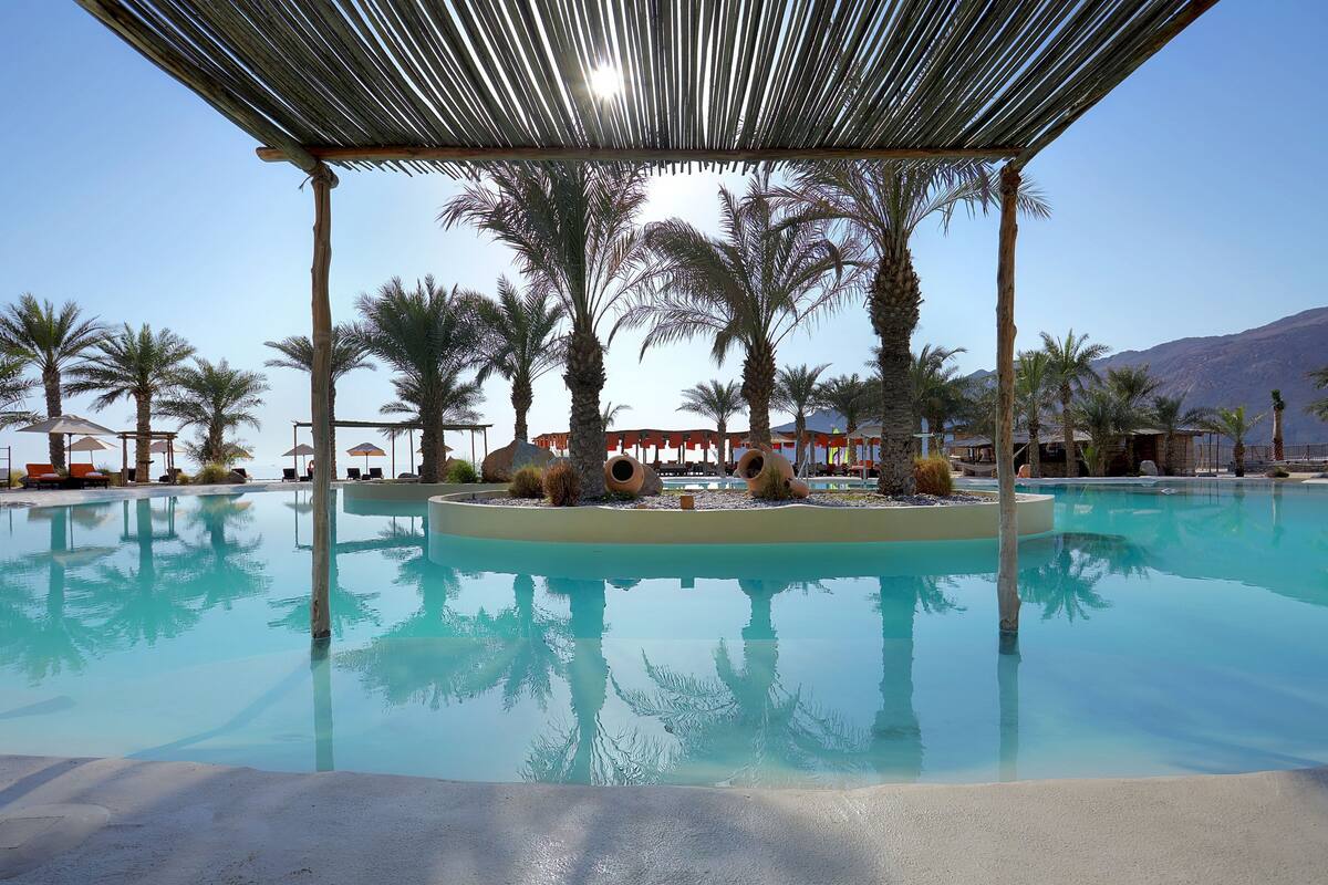 2 outdoor pools, pool umbrellas, pool loungers
