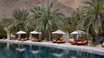 2 outdoor pools, pool umbrellas, pool loungers