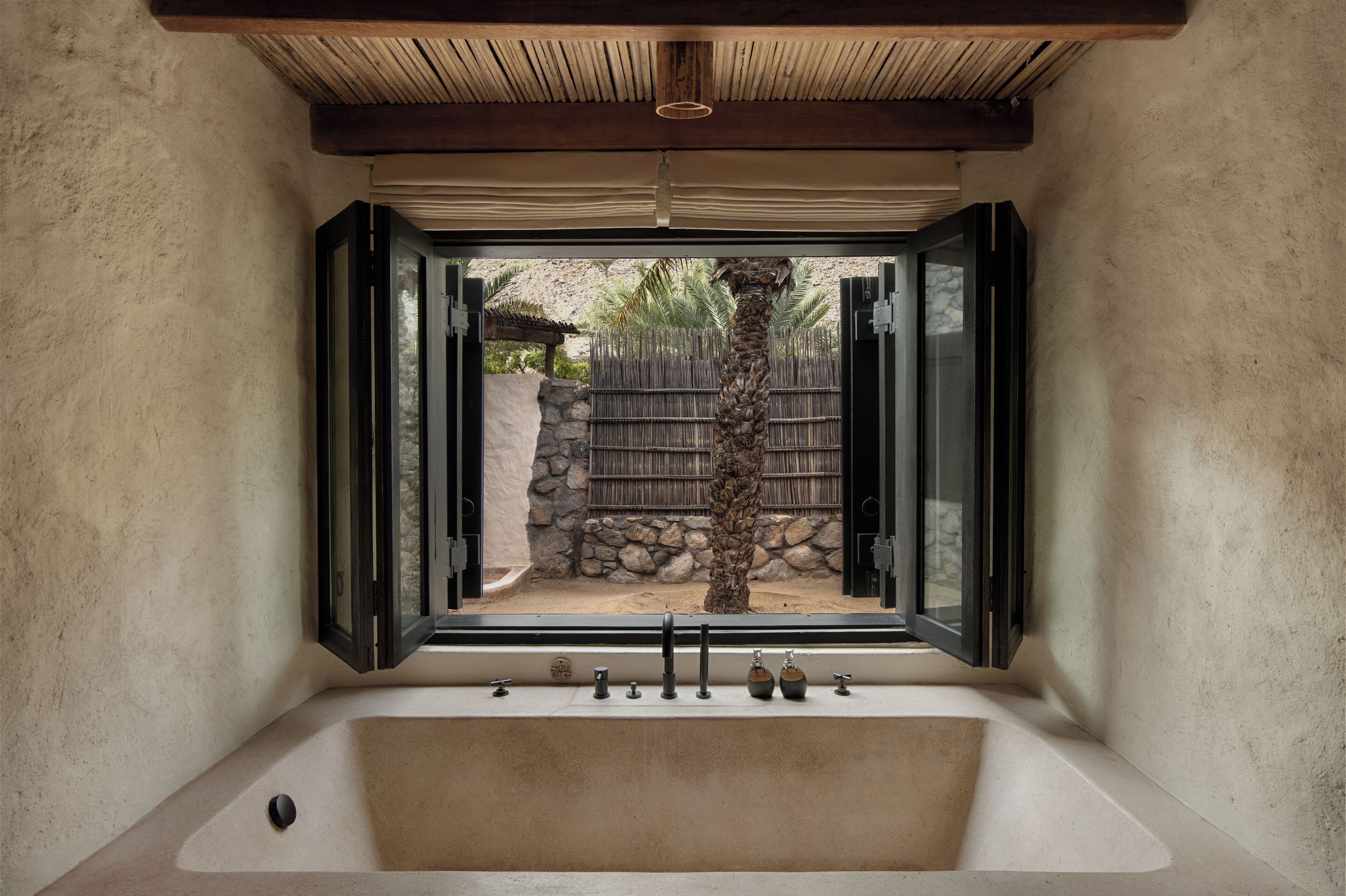 villa (pool suite) | bathroom | eco-friendly toiletries, hair dryer, bathrobes, slippers