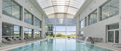 Indoor pool, outdoor pool, pool umbrellas, sun loungers