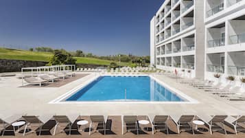 Indoor pool, outdoor pool, pool umbrellas, pool loungers